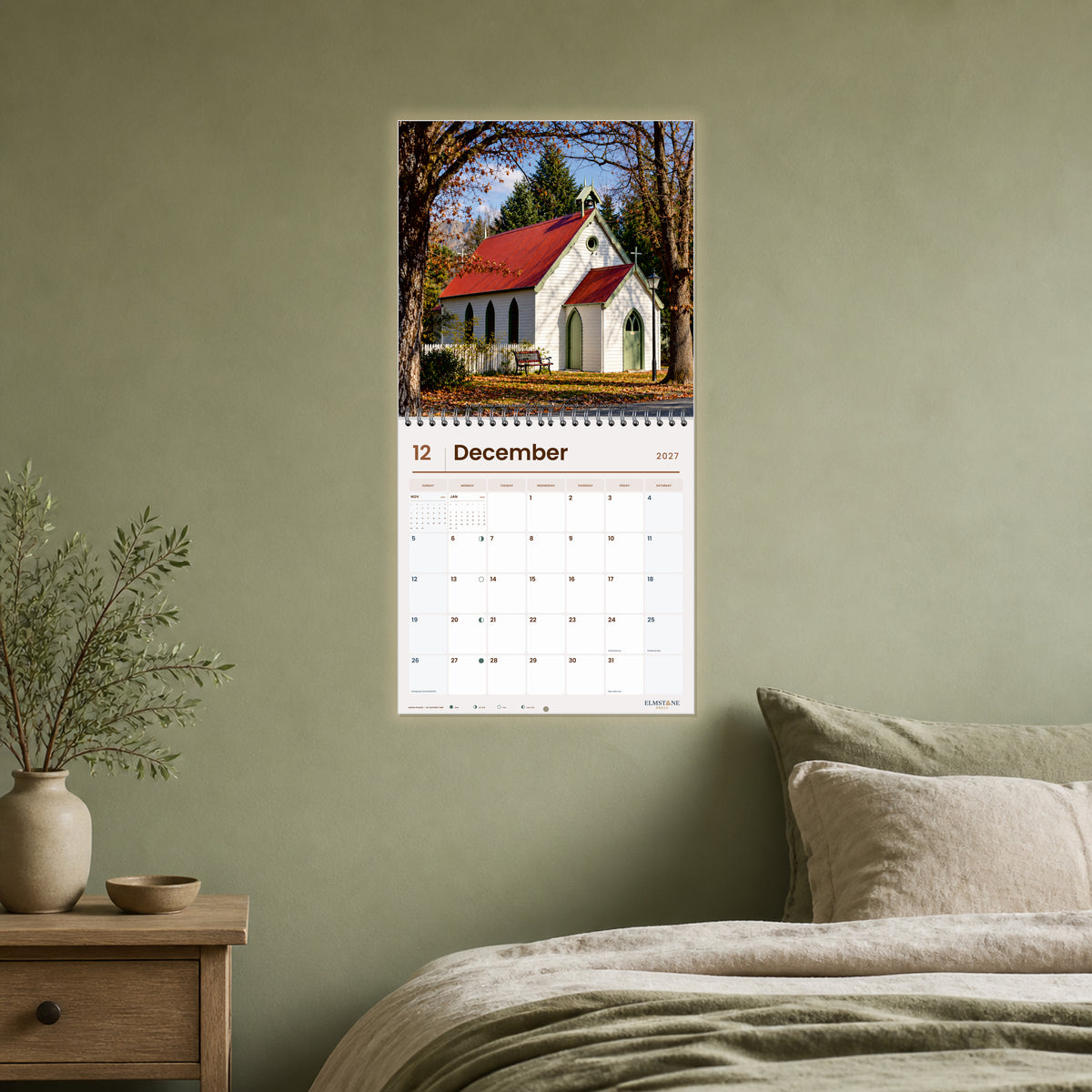 2027 Arrowtown New Zealand Wire-O square wall calendar - open calendar displayed in a sage bedroom december