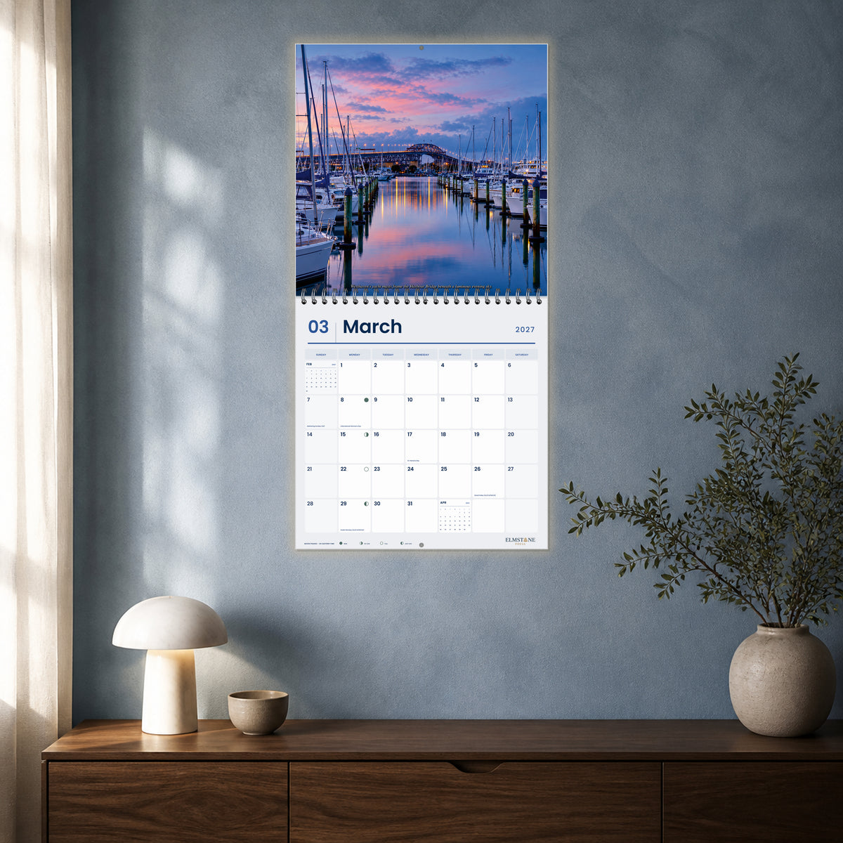 2027 Auckland New Zealand Wire-O square wall calendar - open calendar displayed in a blue studio march