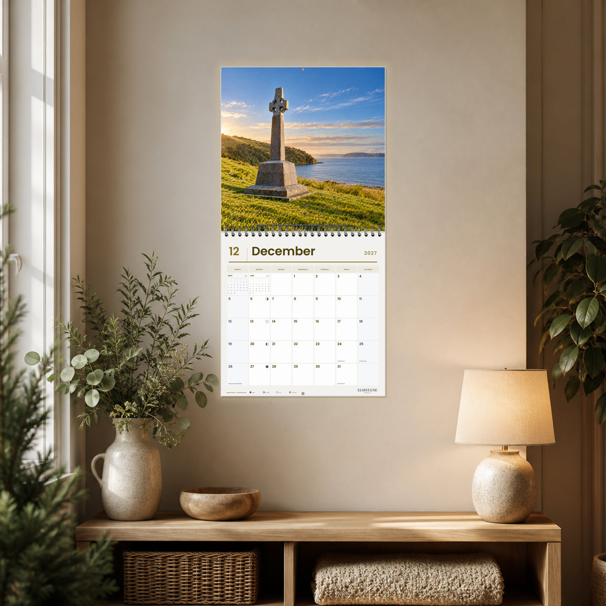 2027 Bay of Islands New Zealand Wire-O square wall calendar - open calendar displayed in a close reading nook december